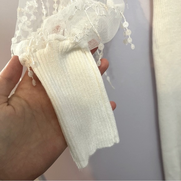 Cato Small White Knitted Dress with Long Mesh Sleeves and Dangly Sequins - Picture 5 of 9